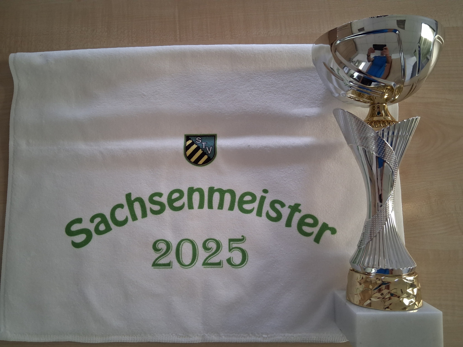 Siegerpokal und Siegerhandtuch